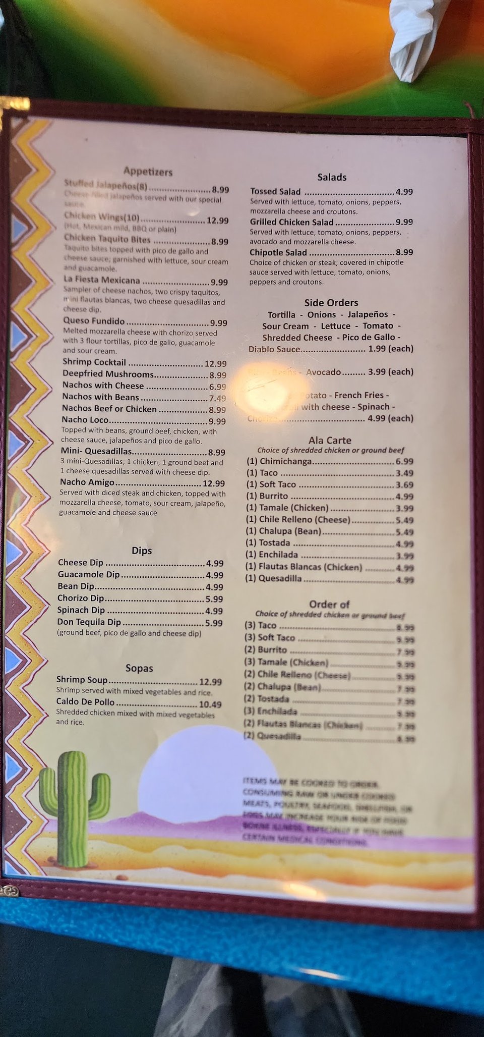Printed menu with Mexican favorites and salads